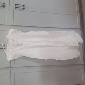 woman's Anthropologie swimsuit coverup linen